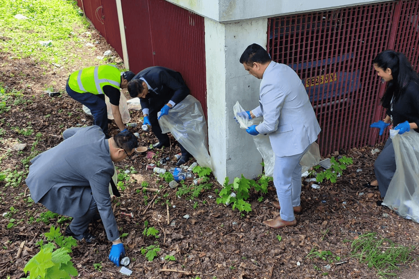 Colleagues collect waste from green spaces near Copthorne Hotel Slough-Windsor