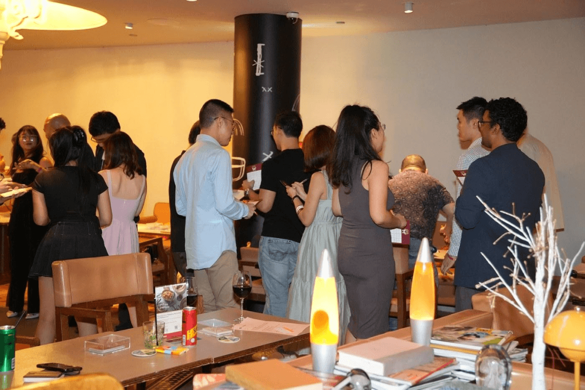 Guests mingle over ice-breakers at The Social Butterfly Singles Mixer, held at Beast & Butterflies.