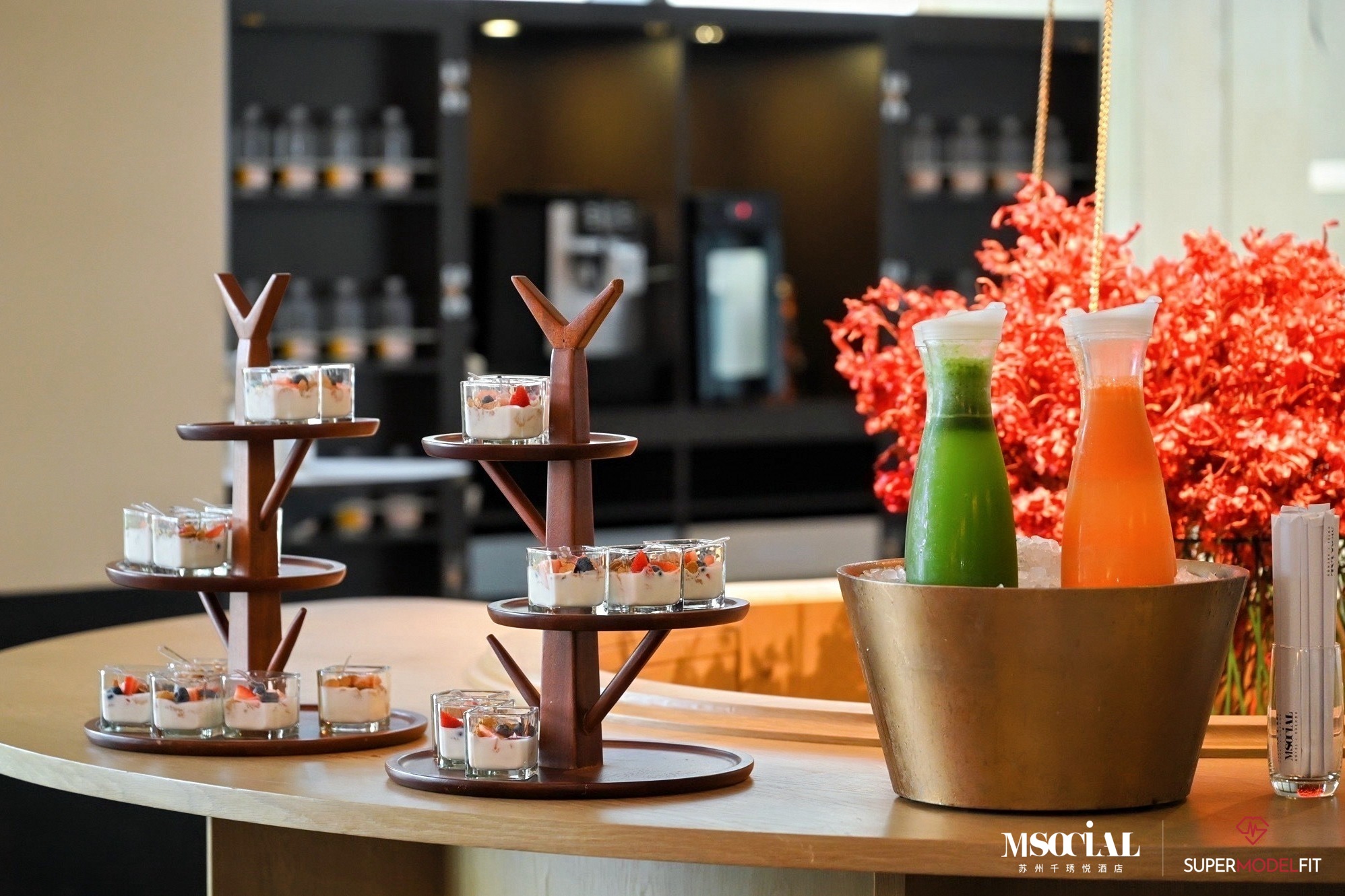 Yoghurt parfaits and chilled juices set out for the yoga session break.