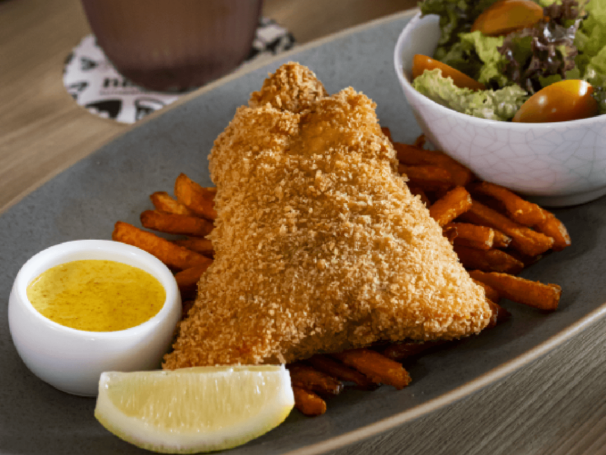 Crispy Salmon and Chips, one of the western mains joining the new à la carte menu.