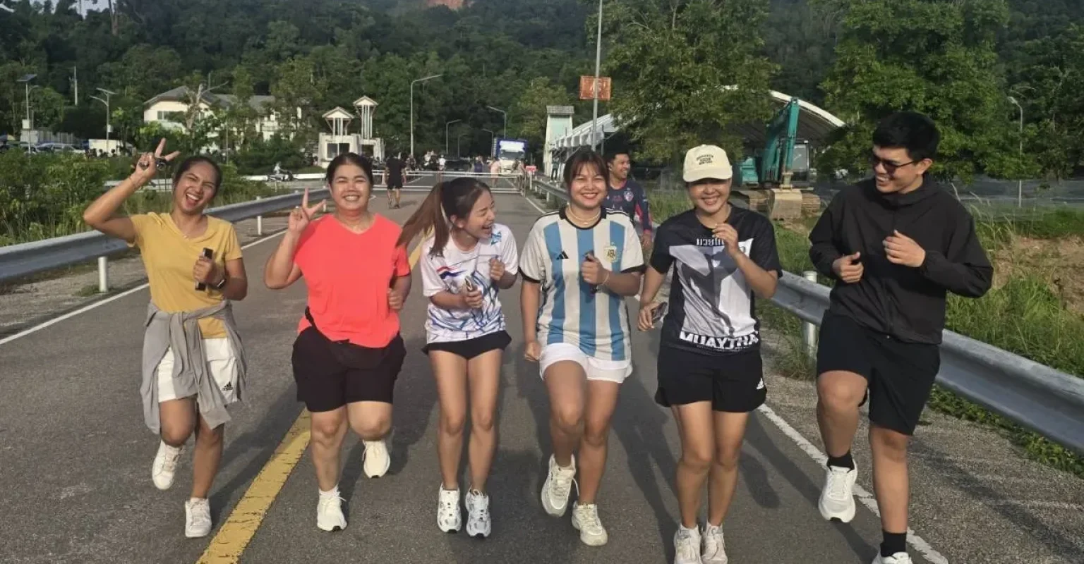 Buddies sharing laughter and joy during outdoor activities, building bonds beyond the workplace