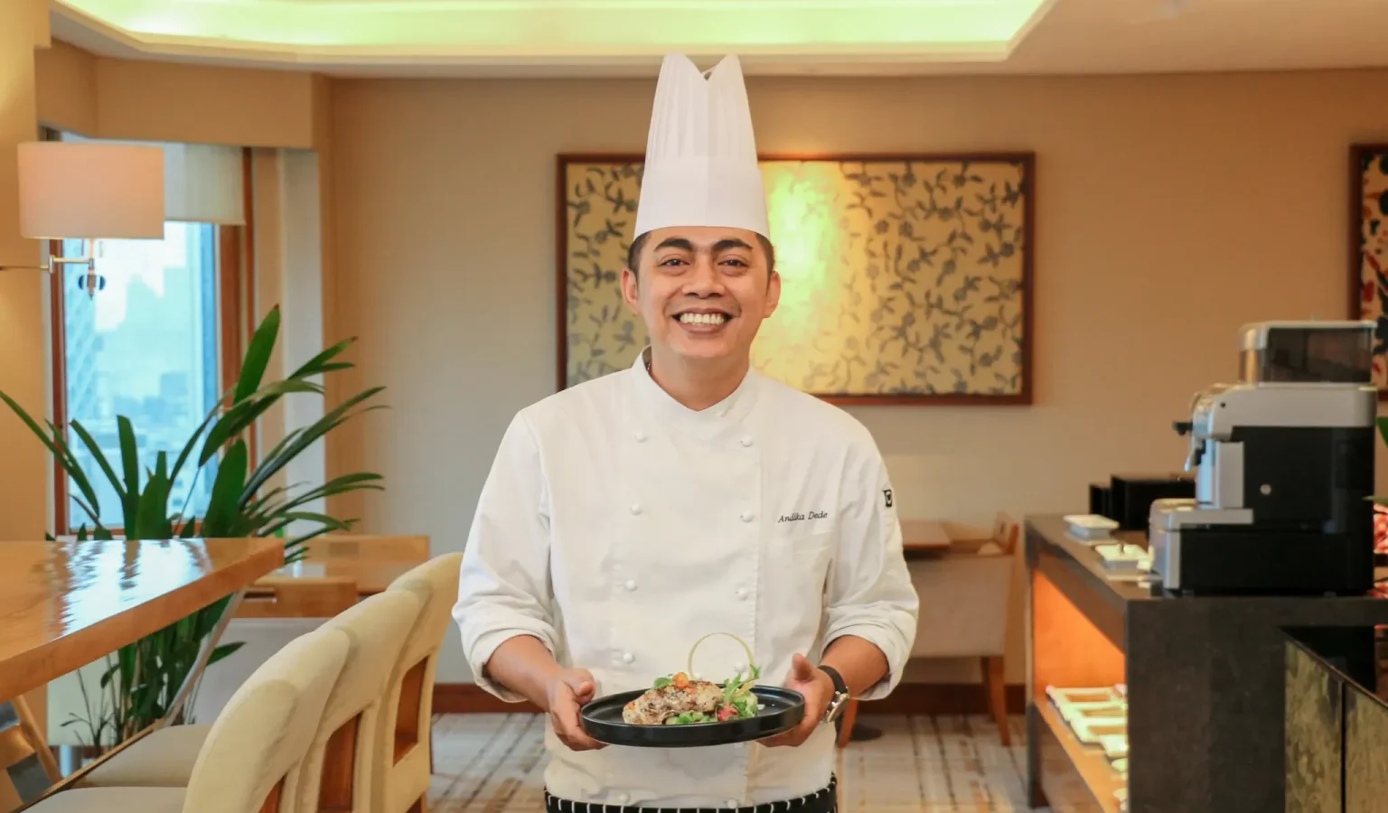 Chef Andika Dede Zakaria with his signature dish, Ocean-Kissed Snapper