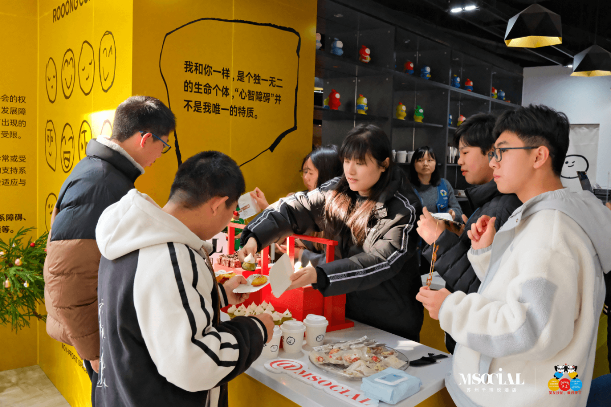 Children enjoying refreshments and activities at M Social Hotel Suzhou's community gathering