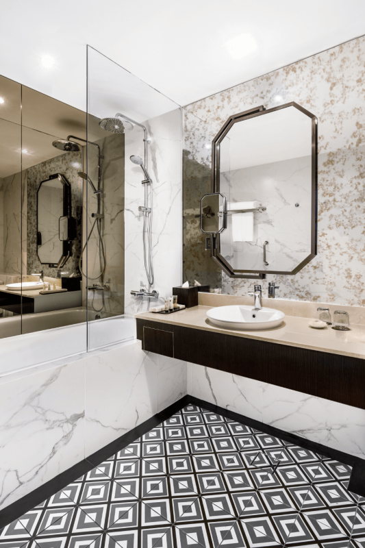 Modern bathroom featuring water-saving fixtures achieving 60% reduction in consumption