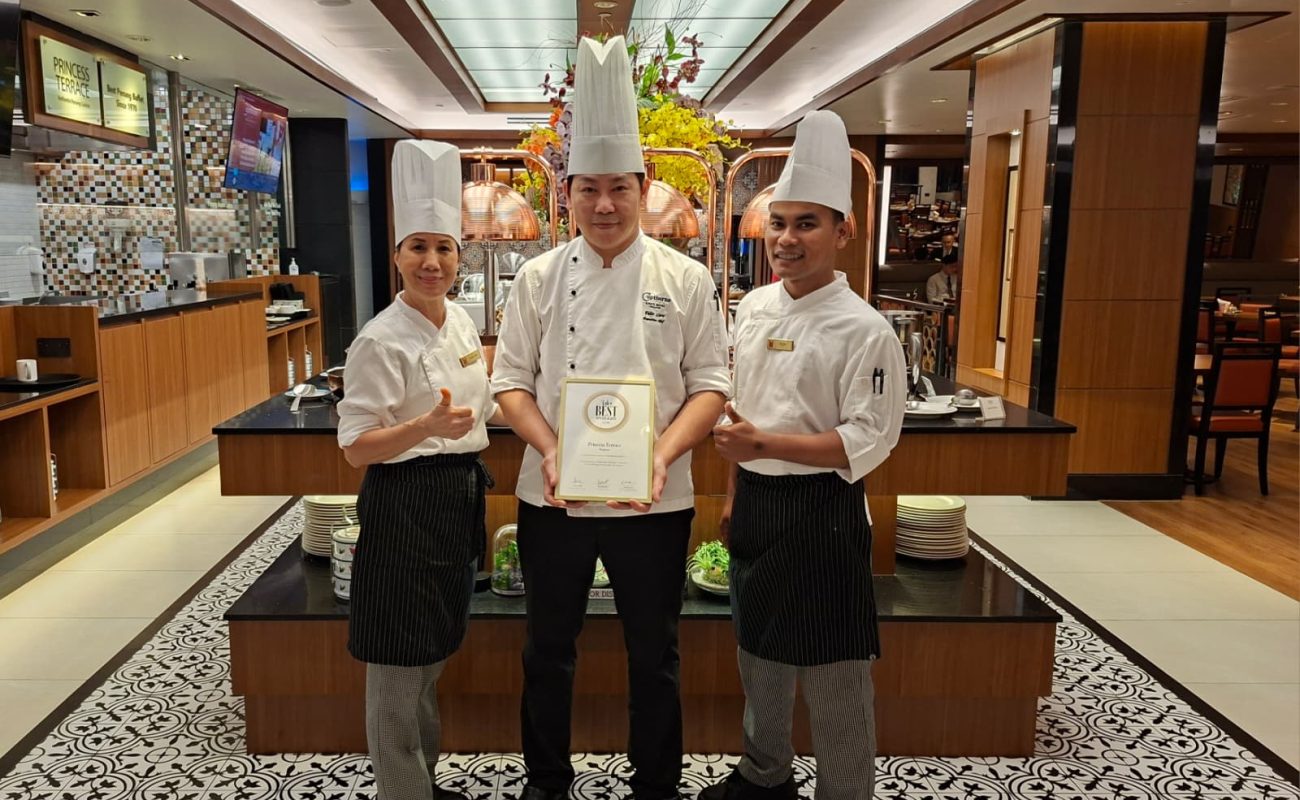 Chefs flank the framed Tatler Best Spotlight 2026 certificate at Princess Terrace.
